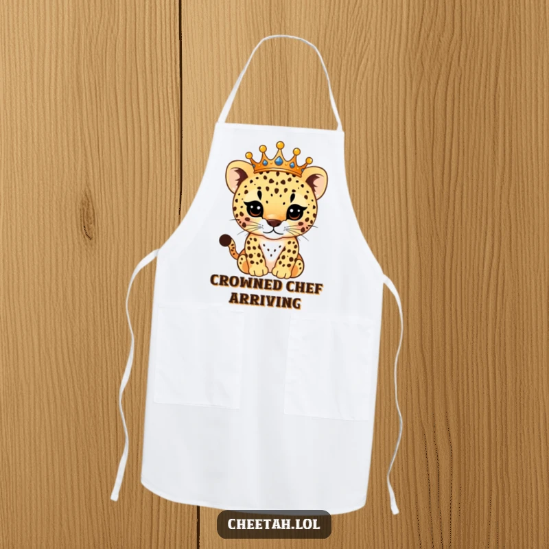 Funny Apron featuring a majestic cheetah cub chef wearing a sparkling crown, its spots glittering, ready to cook up some royal humor.