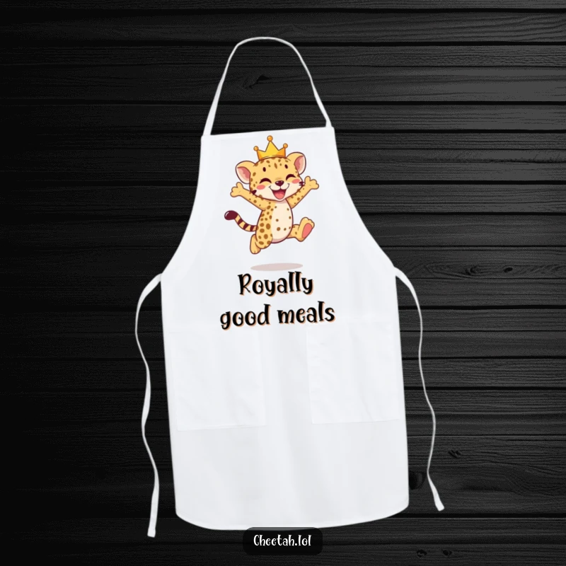 Funny cheetah cub apron showing a crowned cub doing a joyful leap, ready to cook.