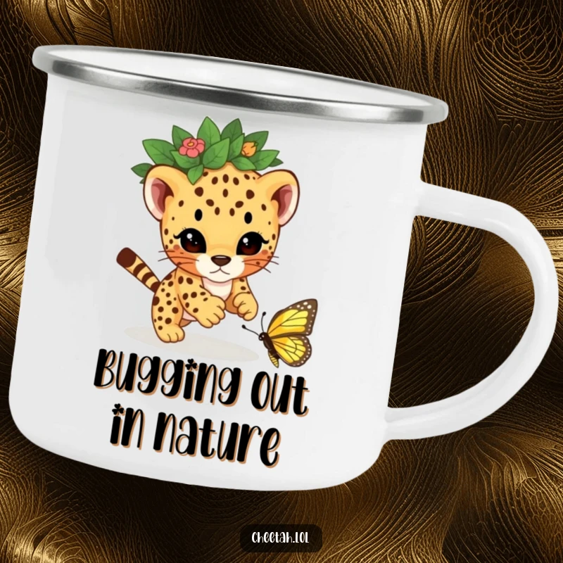 Funny cheetah cub wearing a leaf crown, playfully pouncing on a butterfly, printed on a rugged camping mug for outdoor enjoyment.