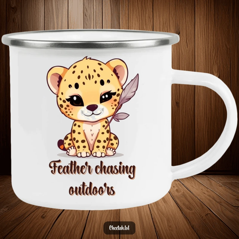 Funny Camping Mug featuring a cheetah cub with a playful wink, batting at a dangling feather, ideal for enjoying drinks outdoors with lighthearted humor.