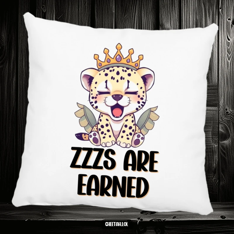 Funny sleepy cheetah cub in a feathered crown yawning, this soft pillow is a cozy and funny gift.