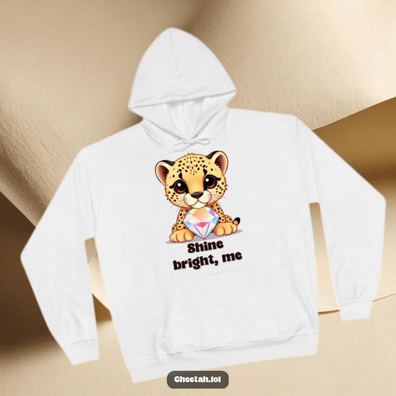 Funny cheetah cub balancing a large, shiny jewel on its nose, on a cozy hoodie, radiating warmth and style.