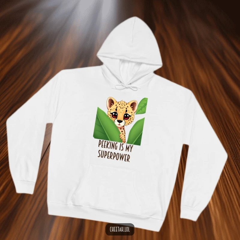 Funny cheetah peeking from behind a giant spotted leaf, its large curious eyes drawing you in on a comfortable and humorous hoodie.