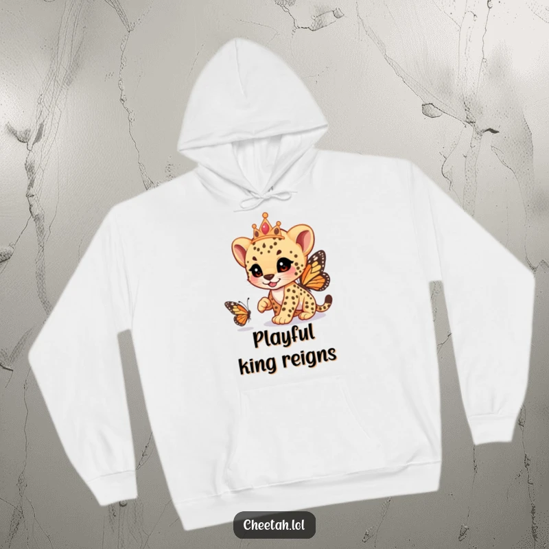 Funny cheetah cub wearing a tiara, playfully racing a butterfly, on a warm hoodie, designed for fun, a hilarious funny gift.