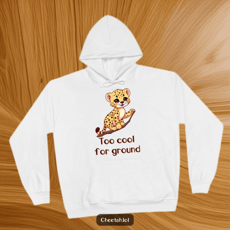 Funny Cheetah Cub Hoodie: A tiny, spotted cub confidently balances on a slender branch, showcasing incredible grace and a playful spirit.