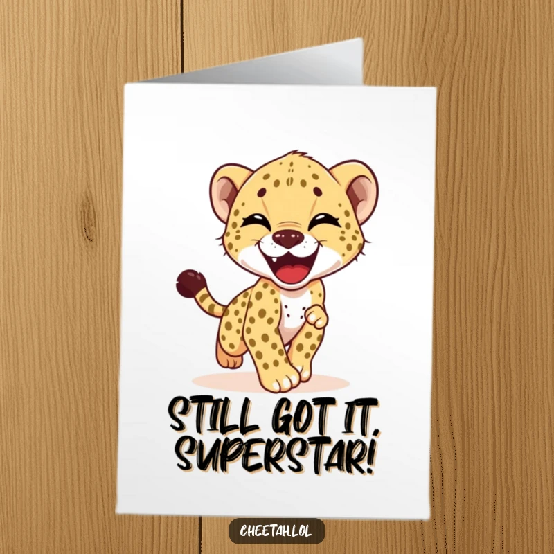 Funny Free Printable birthday card: A giggling cheetah cub joyfully chases its tail, radiating pure, uncontainable happiness.