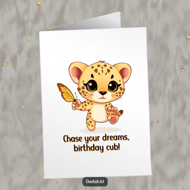 Funny Free Printable Birthday Card: A cheetah cub with wide eyes playfully chases a fluttering butterfly.