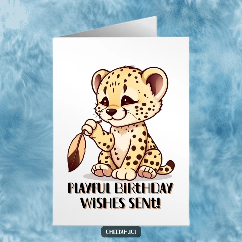 Funny Free Printable Birthday Card: A cheetah cub playfully bats at a dangling feather with excitement.