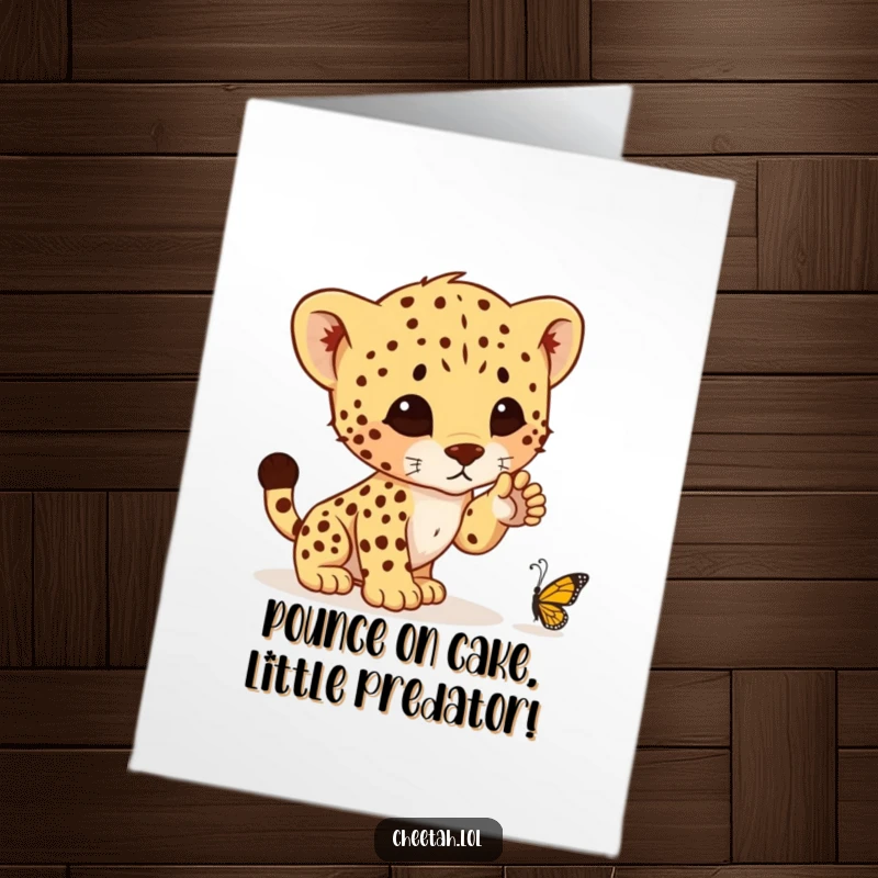 Funny Free Printable Birthday Card: Cheetah cub poised to pounce on a butterfly, a playful surprise for a special day.