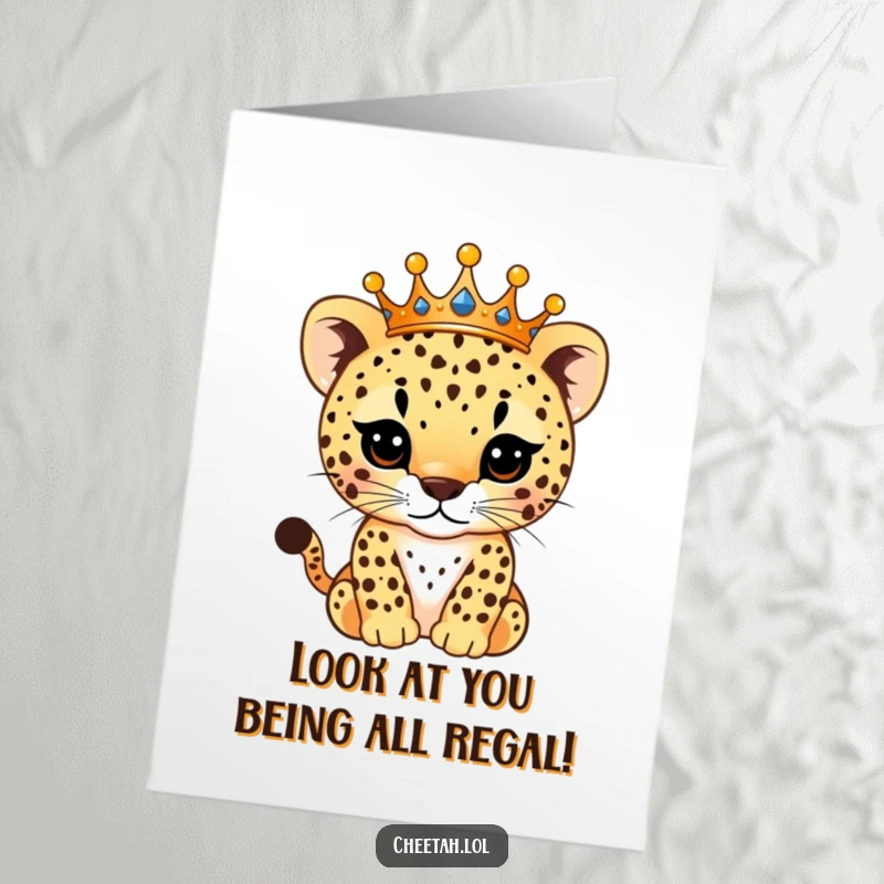 Funny Free Printable Congratulations Card: Regal cheetah cub wearing a crown, spots sparkling, celebrating a grand success.