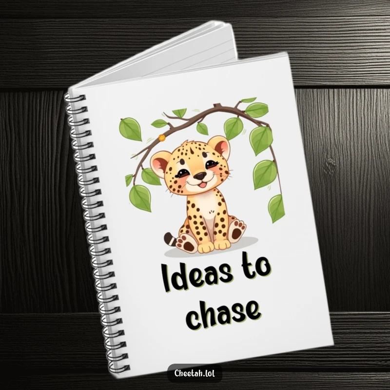 Funny cheetah cub notebook with a playful cub batting at a vine, perfect for notes and wild ideas.