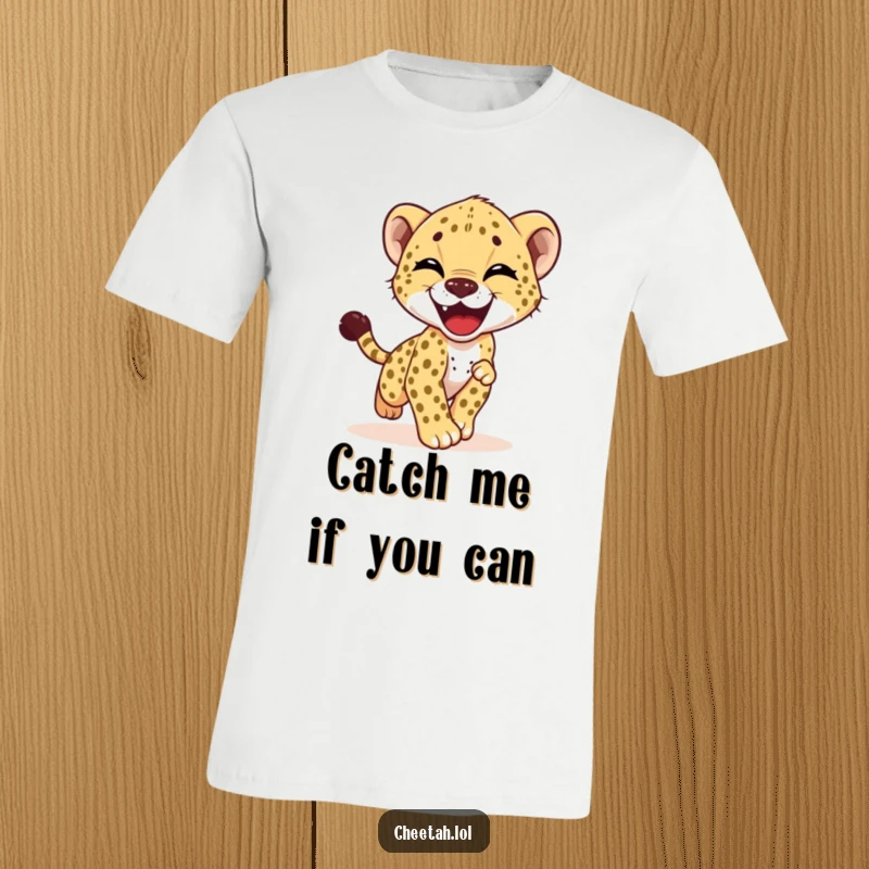 Funny t-shirt showing a delighted cheetah cub gleefully chasing its own tail, radiating pure fun and playful mischief.