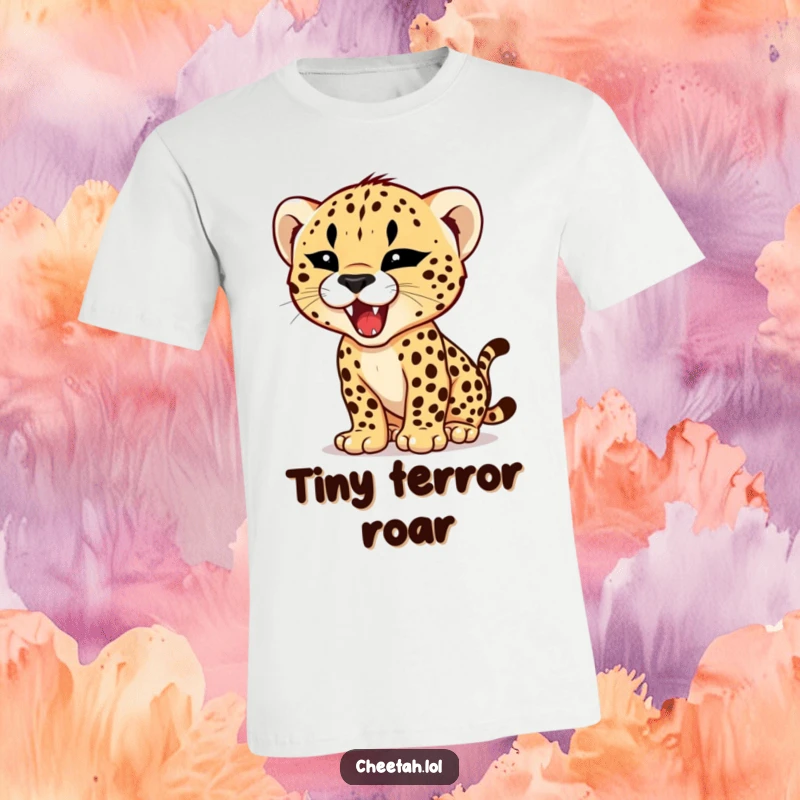Funny t-shirt design of a cheetah cub attempting a roar with a comically tiny, fierce expression, full of hilarious potential.