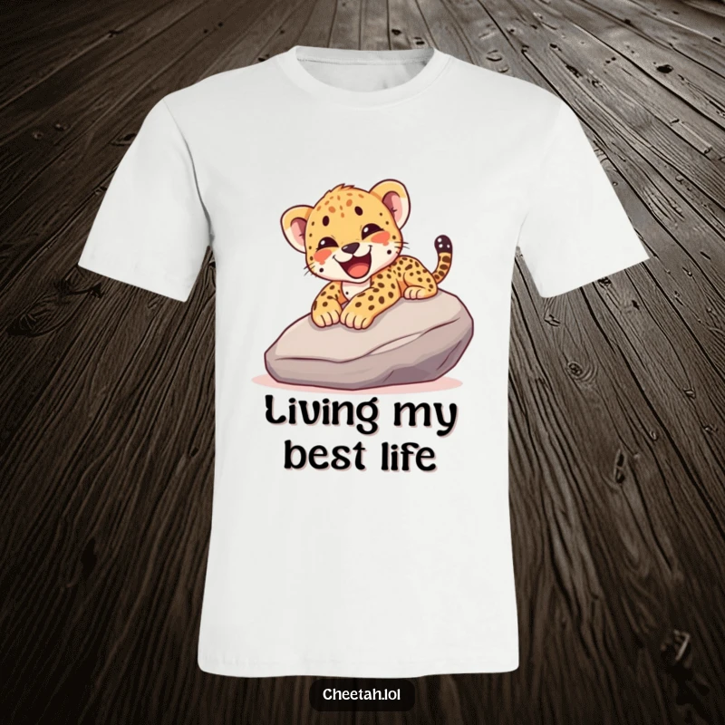 Funny t-shirt featuring a cheetah cub mid-slide down a rock, yelping with pure, unadulterated joy and excitement.