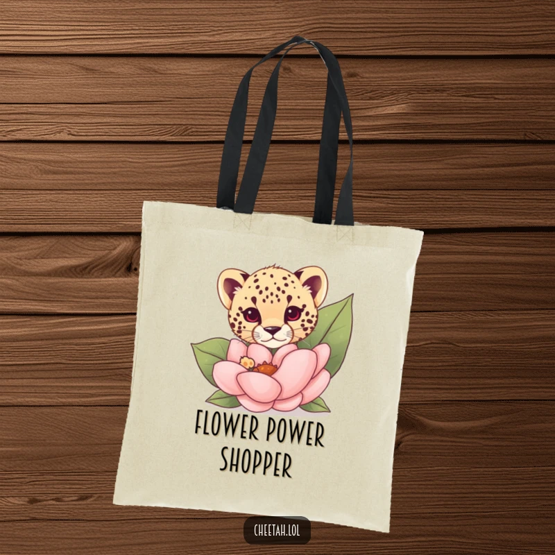 Funny cheetah cub peeking from behind a giant flower on a tote bag, perfect for carrying everyday items.