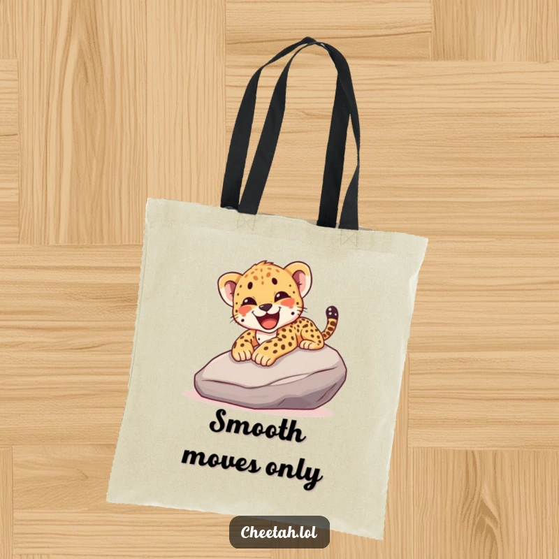 Funny tote bag showcasing a cheetah cub joyfully sliding down a smooth rock, yelping with excitement, perfect for carrying daily items.