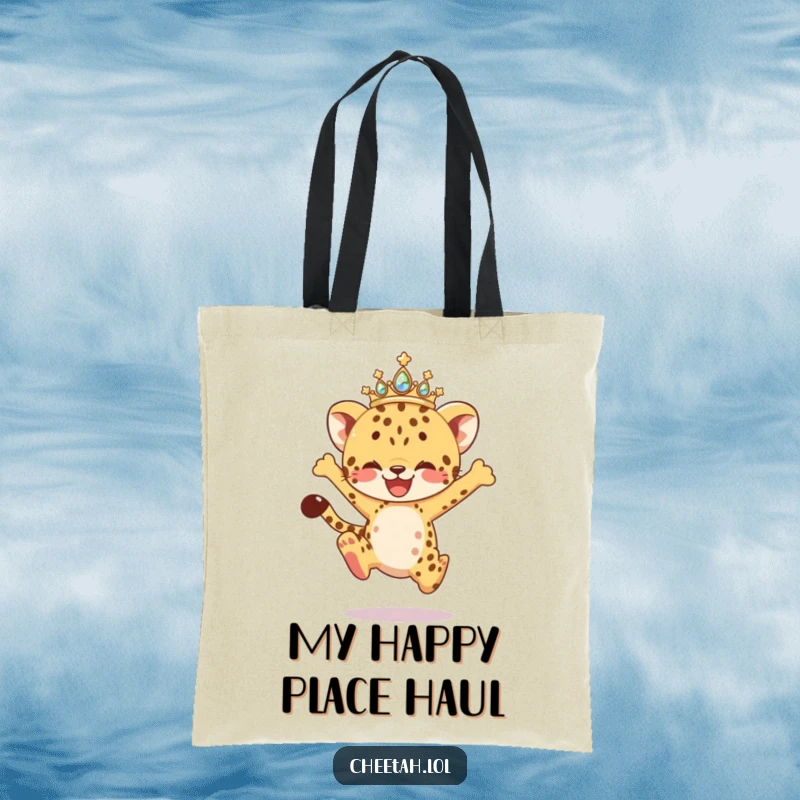 Funny Tote Bag featuring a cheetah cub in a dazzling tiara, captured in a dynamic, joyful leap, making errands more exciting and humorous.